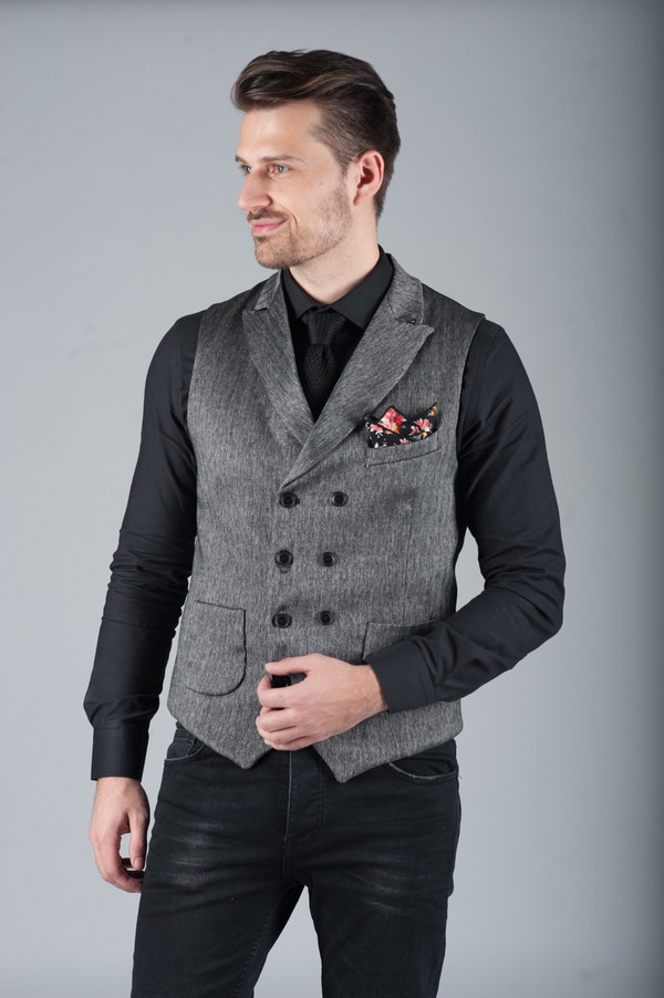 grey vest black shirt